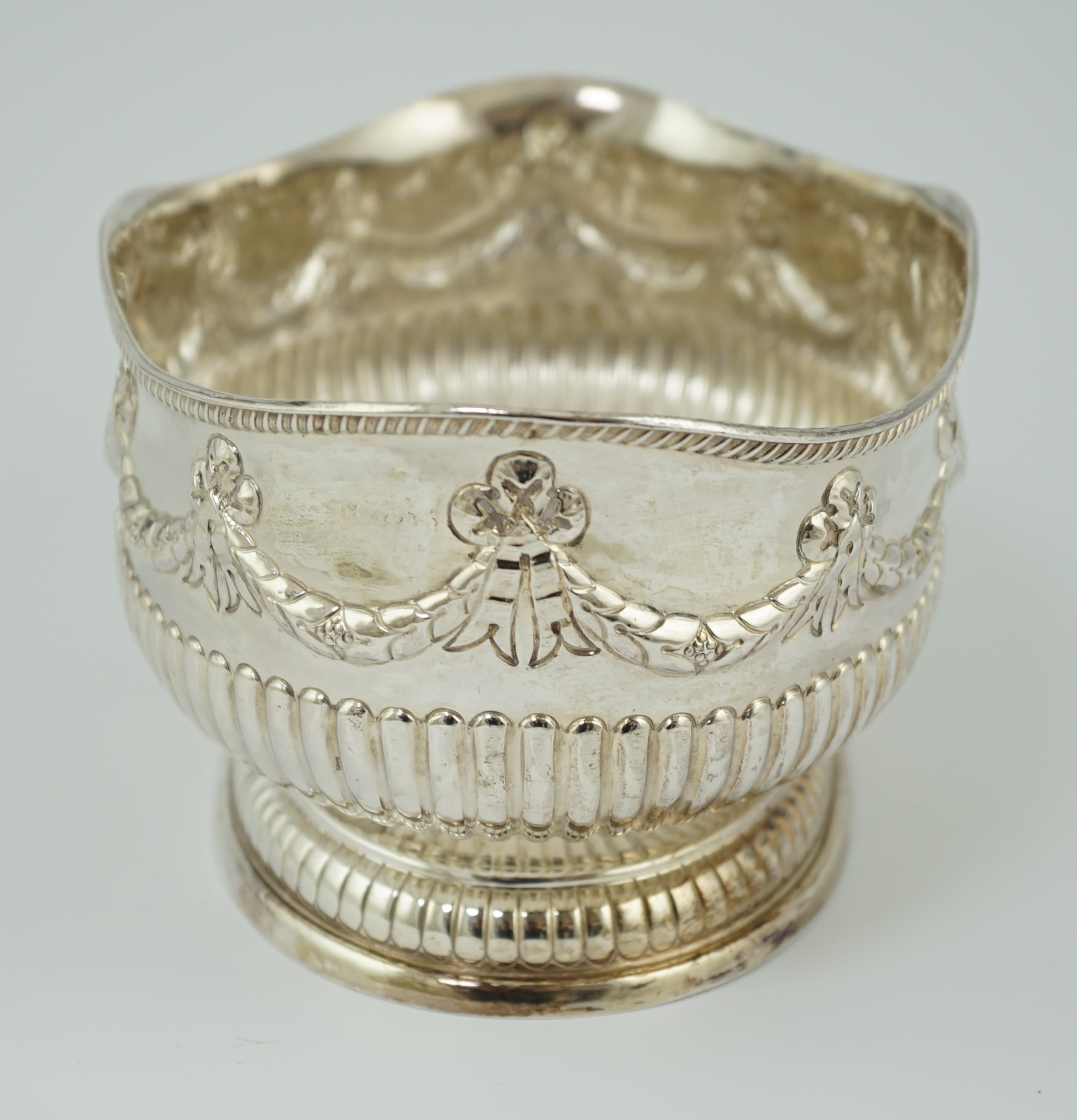 A late Victorian demi-fluted silver oval fruit bowl, by Martin, Hall & Co